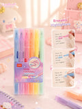 A set of six pastel-colored erasable highlighters in a clear plastic case, displayed on a pink background with cute stationery props and informational text overlays.